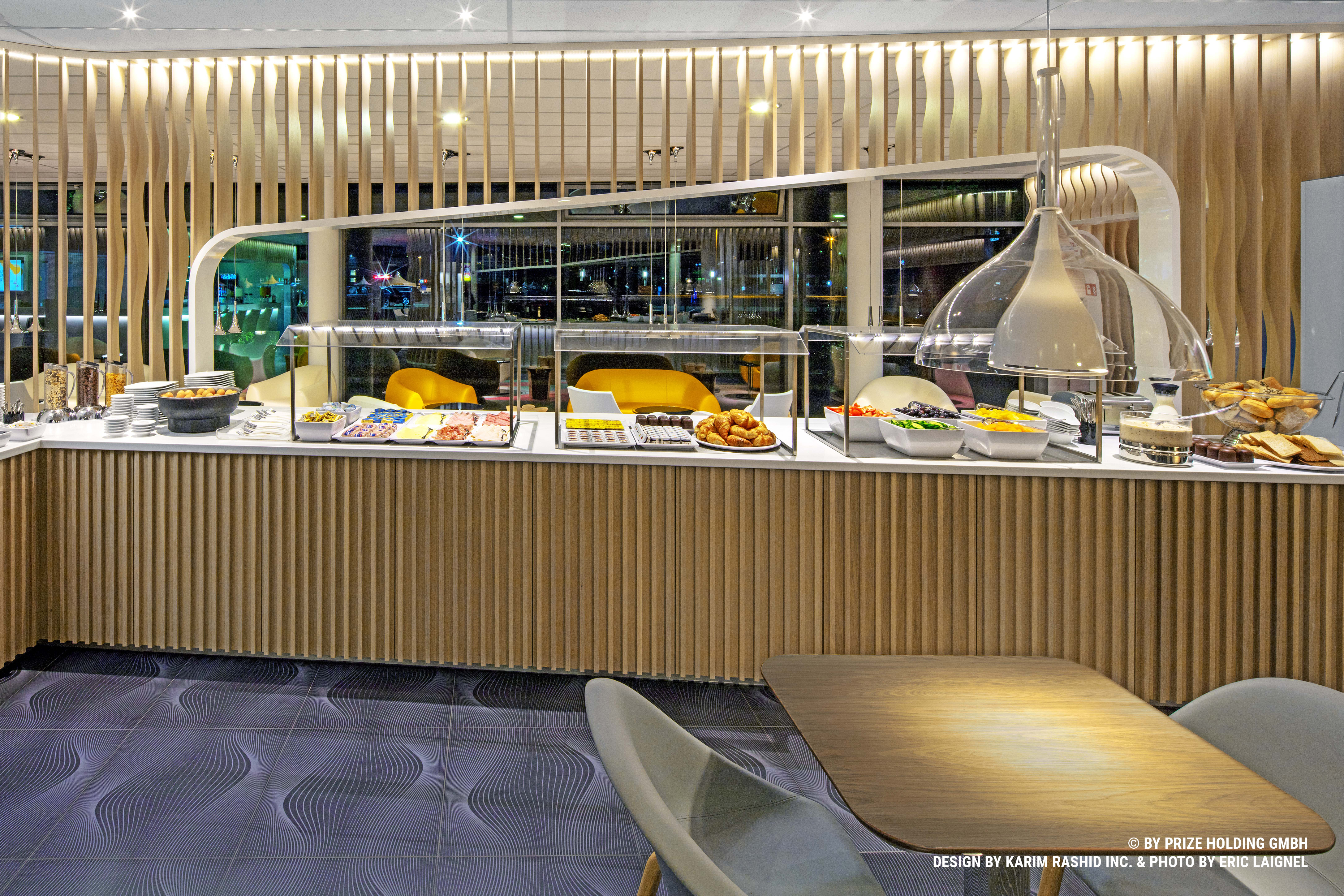 Breakfast buffet with golden elements and a variety of food