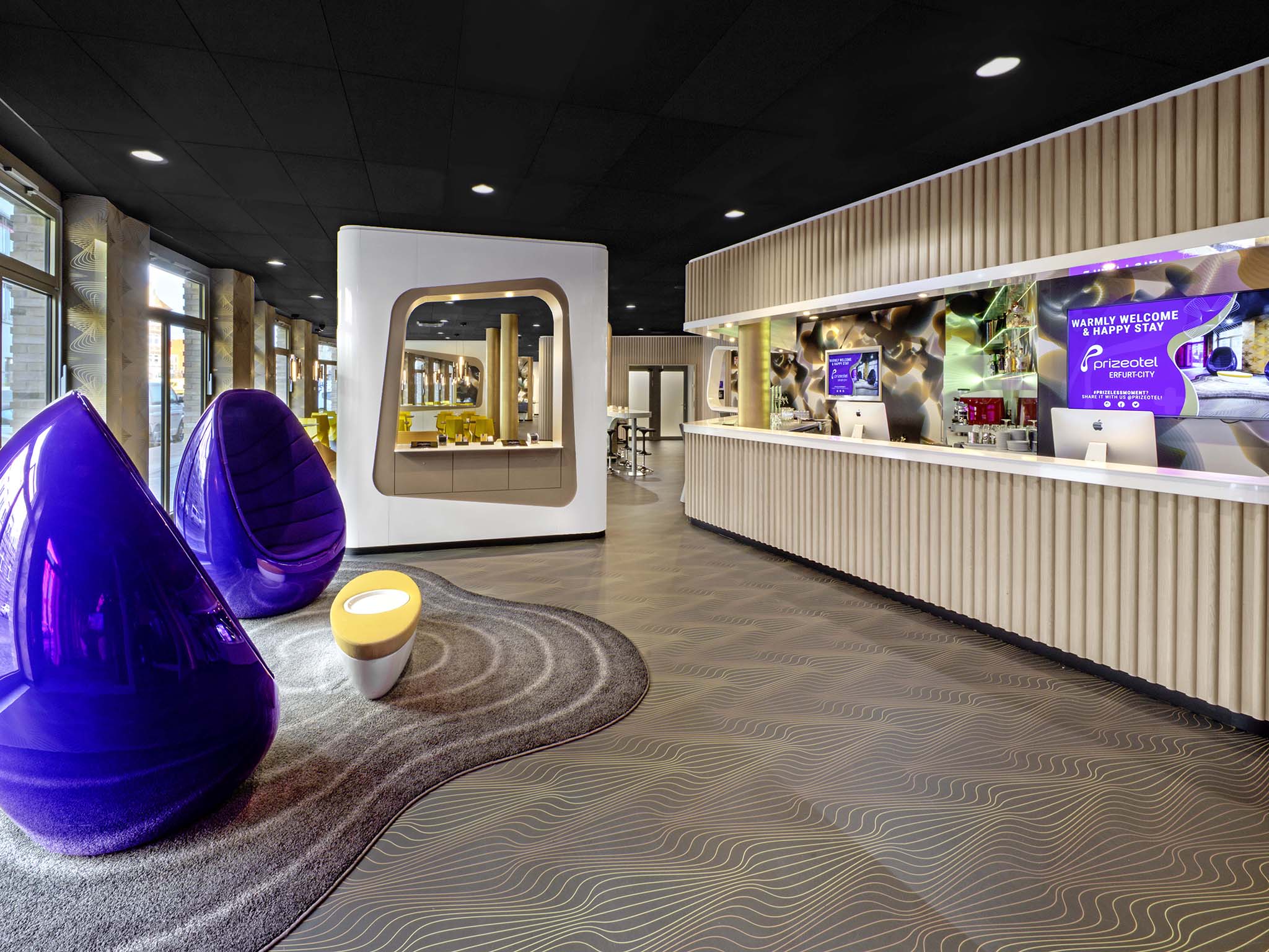 prizeotel Erfurt-City lobby lounge egg chairs and front desk