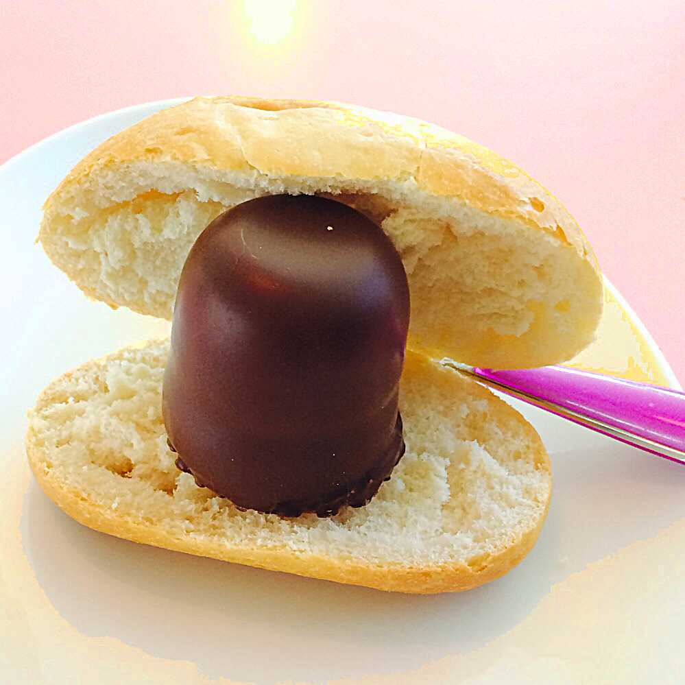 Step 2: Put the chocolate covered marshmallow inside the bun.