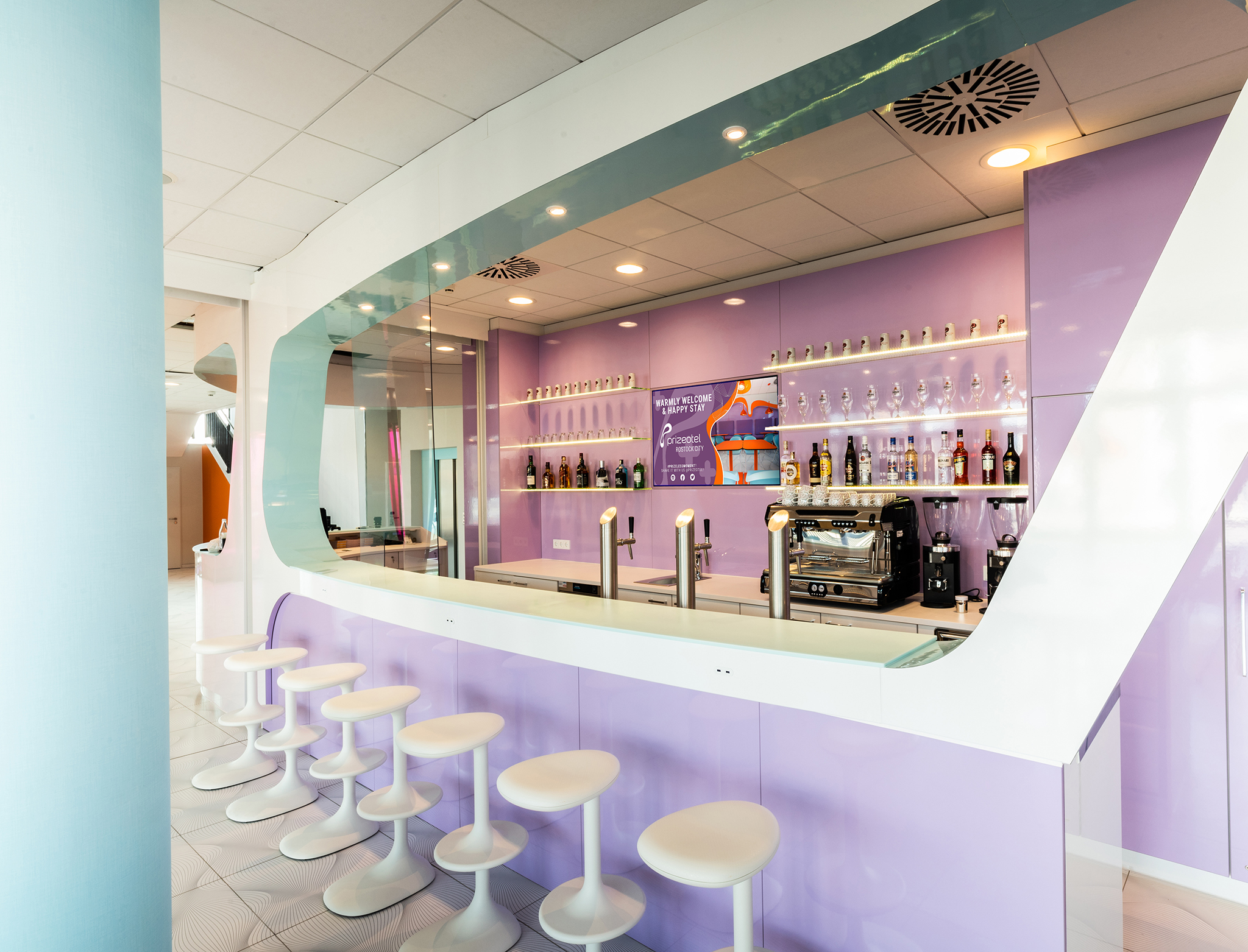 The pastel-coloured bar of the prizeotel in Rostock